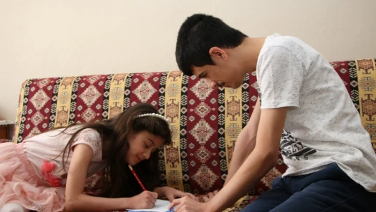 Özel çocuklarına devletin desteğiyle hem anne, hem baba oldu