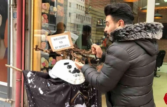 Berber müşteri bulamayınca kardan adamı tıraş etti