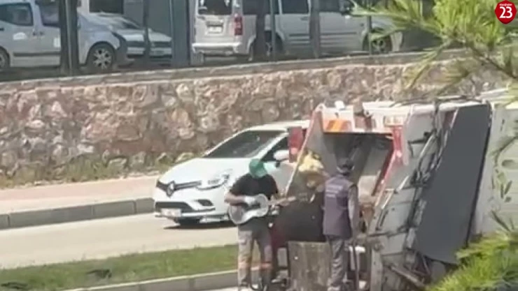 İşini aşkla yapan çöpçüden 'Rock yıldızını' aratmayacak görüntü