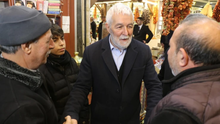 MHP Belediye Başkan Adayı Doç.Dr.Aygen'den Kapalı Çarşı Esnafların Ziyaret